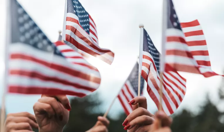 Memorial Day 2023 Hands Waving Small American Flags